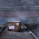 The very crate, about whose form a mood of gloomy apprehension lingers.